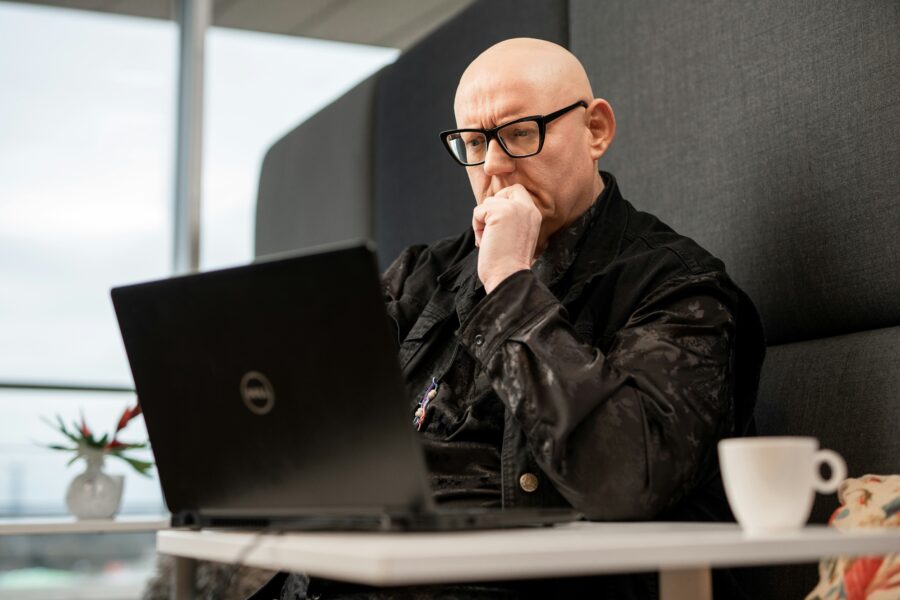 Man taking survey on computer